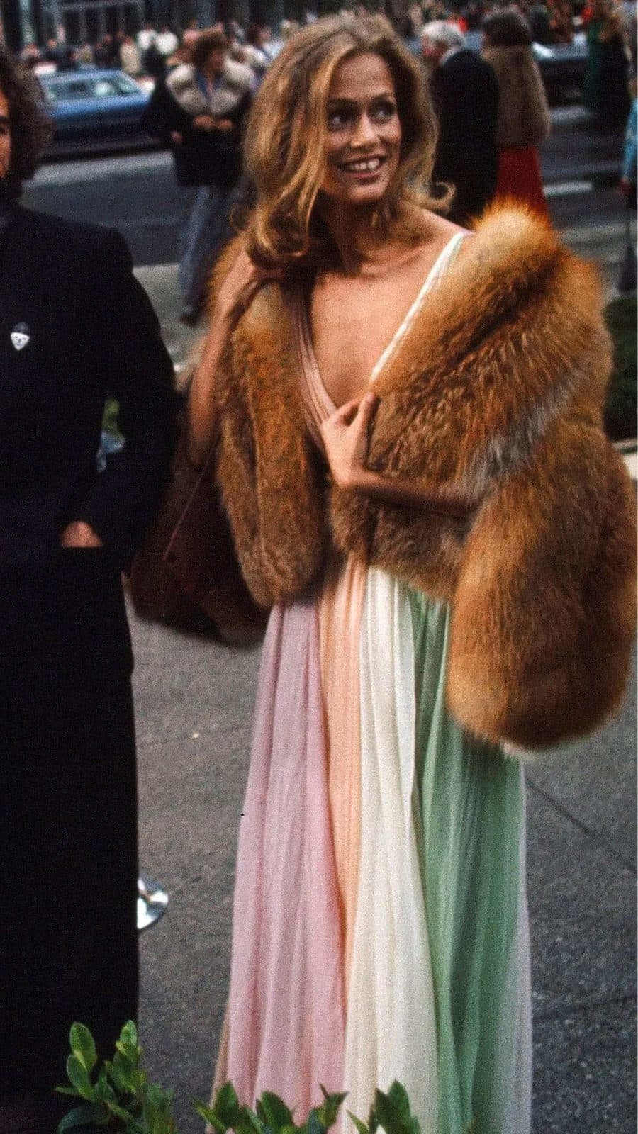 Fur stole over a pastel pleated gown, product line inspiration